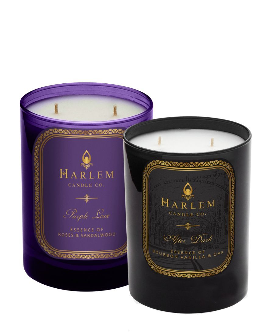 This is an image of our Purple Love and After Dark candles pictured on a white table.