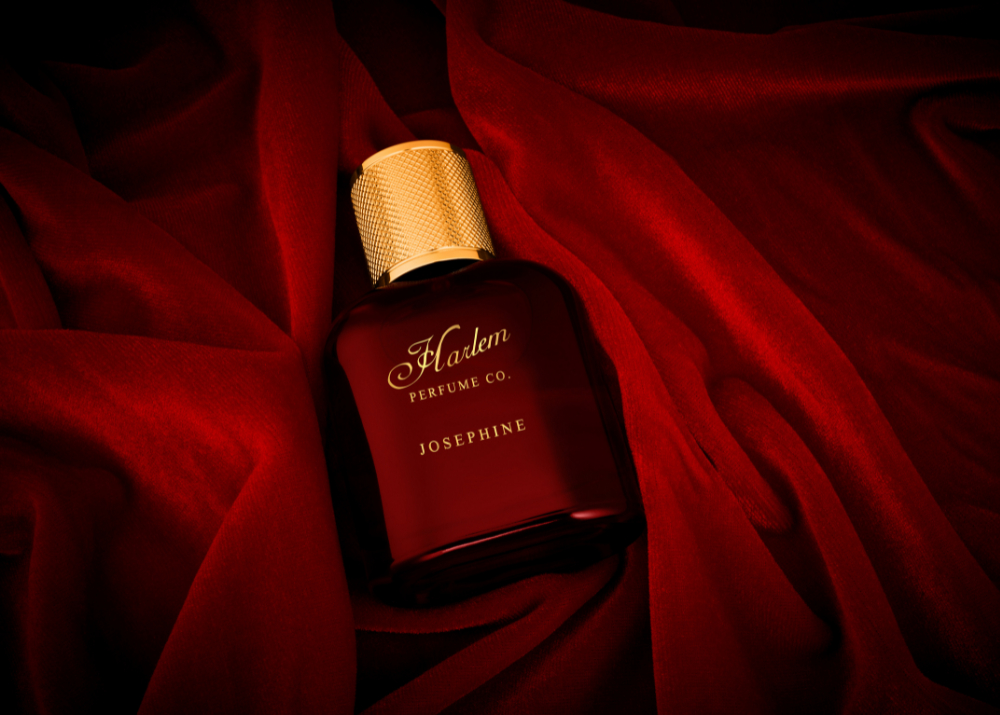 Image of the Josephine eau de parfum laying against a red velvet backdrop