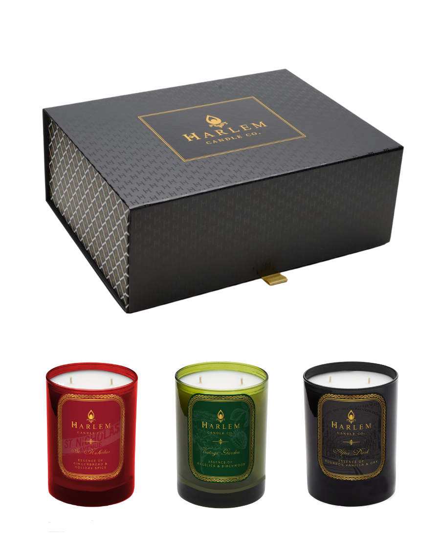 St. Nicholas, Vintage Garden and After Dark Candles pictured in front of the gift box they are packaged in.
