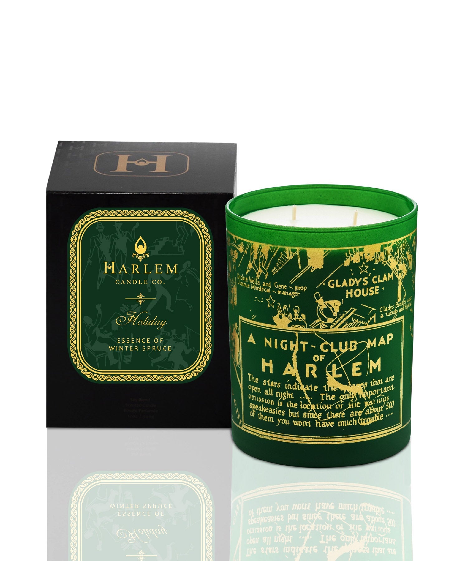 Green glass 12 oz Holiday candle with the nightclub map of harlem painted in 24K gold on the green glass on a white background sitting next to the decorative gift box.