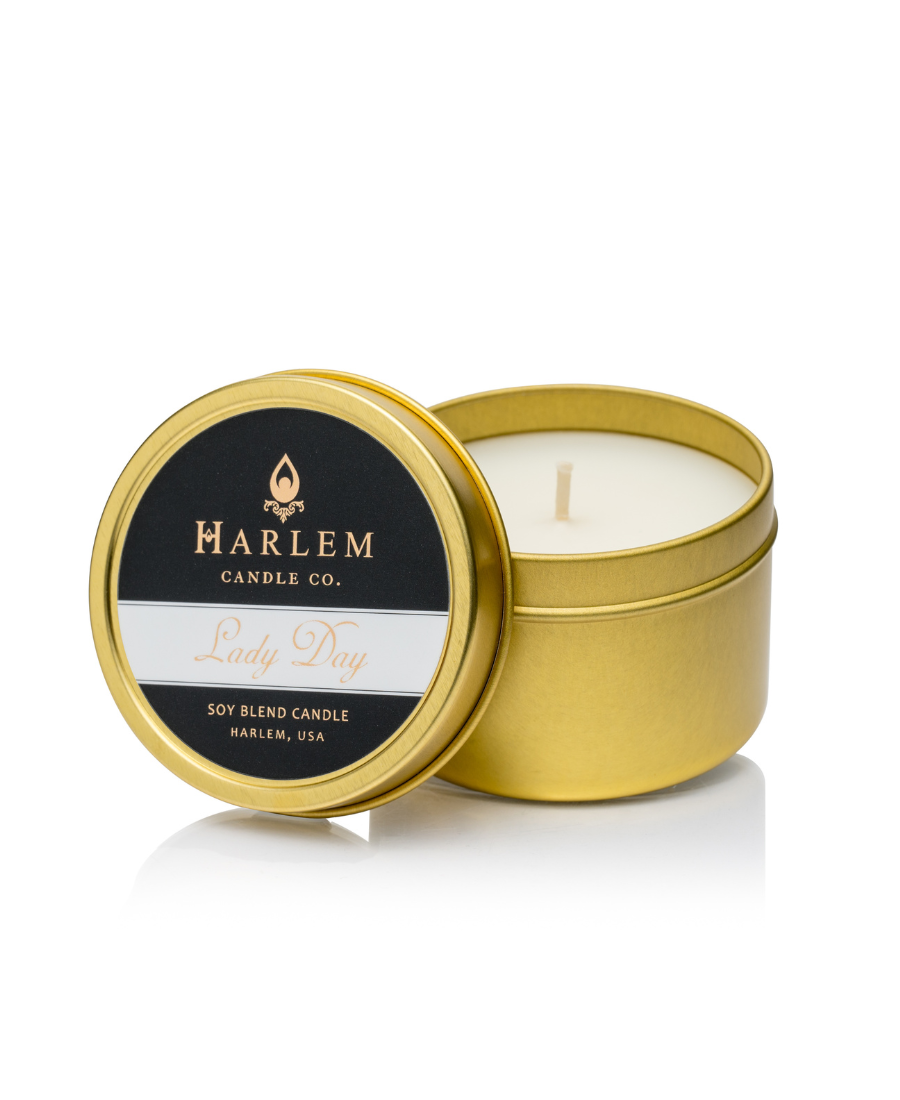 Our stunning Lady Day travel candle in a  gold metal tin.