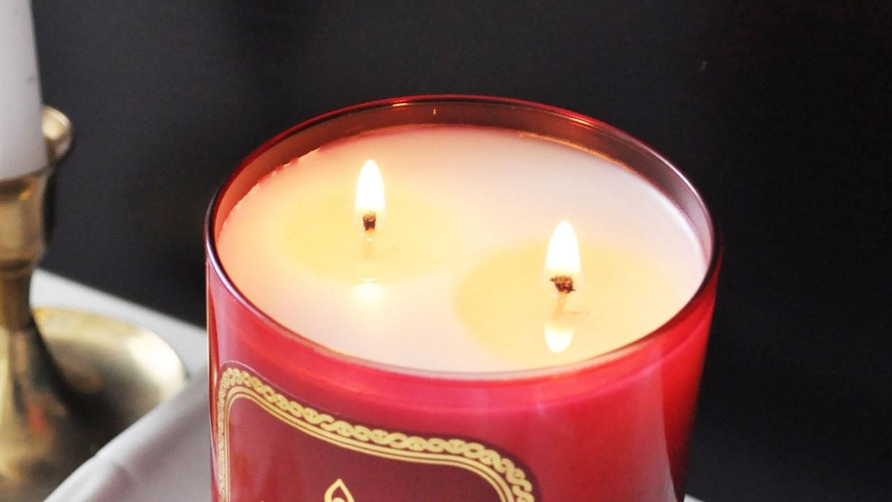 candle wax transforms into carbon dioxide and water vapor