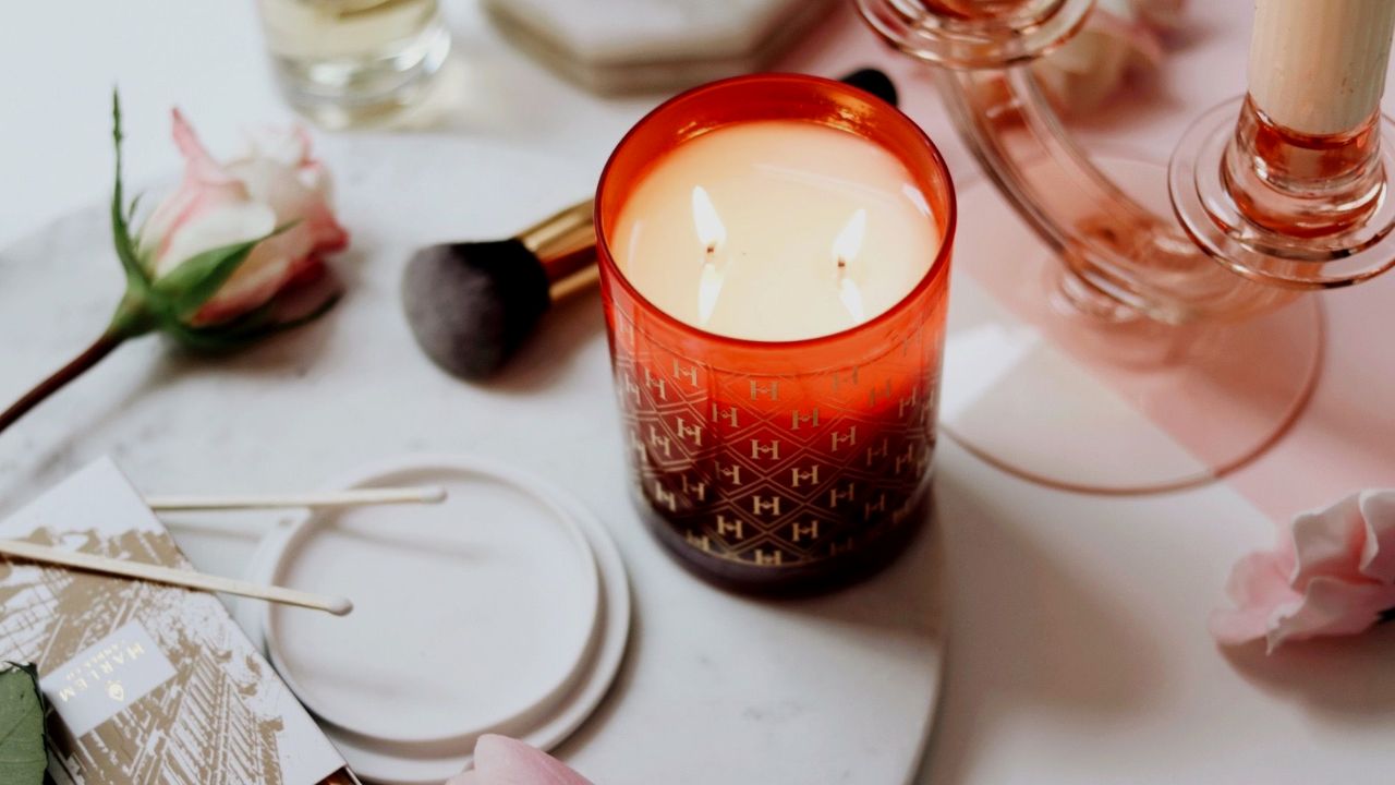 The Josephine luxury candle on a table