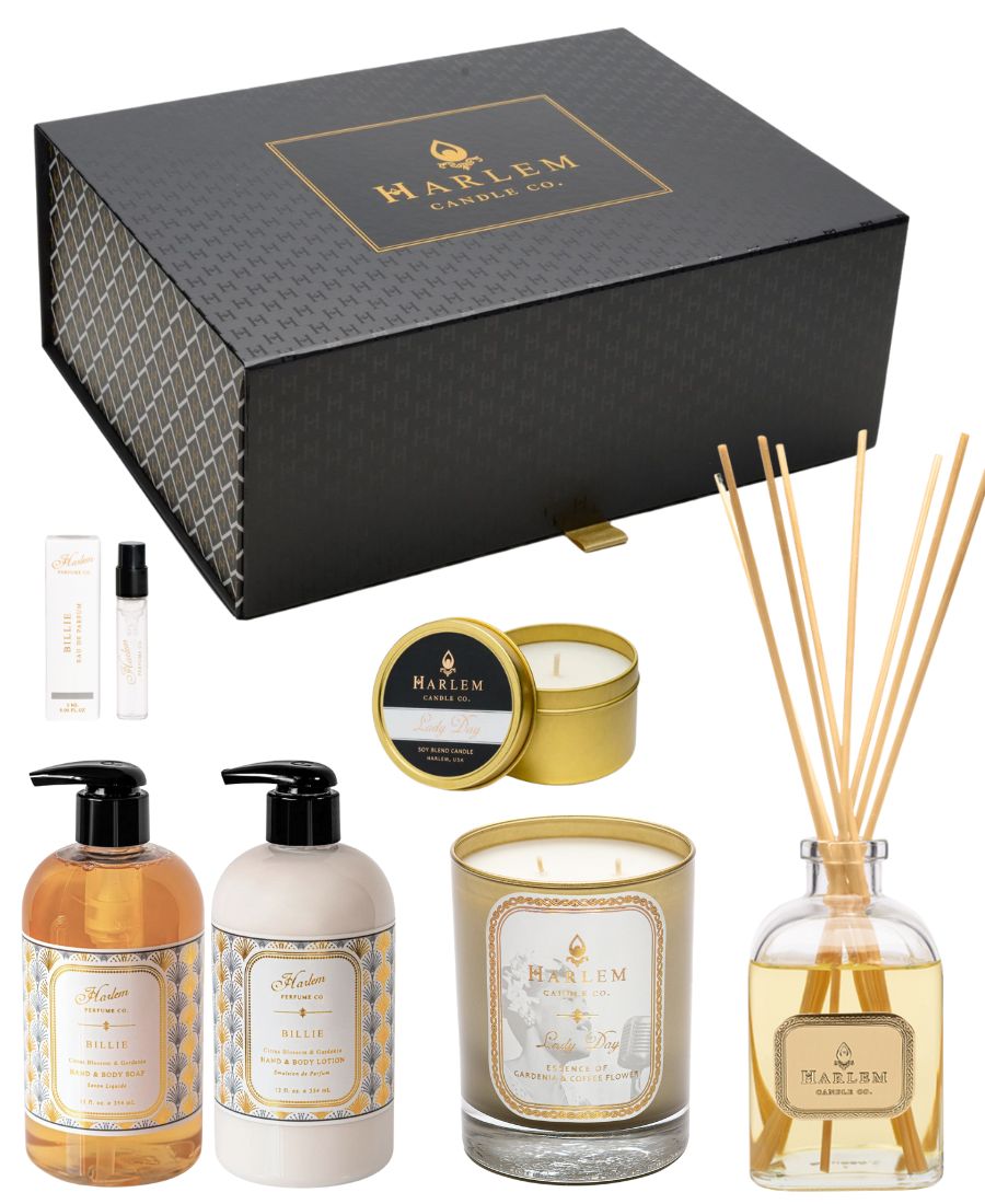 This is a product image of the Billie vibes collection, which includes our elegant Harlem Candle Company gift box, our Billie soap and lotion set, our Lady Day 11 ounce candle, our Lady Day reed diffuser, our Lady Day travel candle, and a 2 ounce sample of our Billie Perfume.