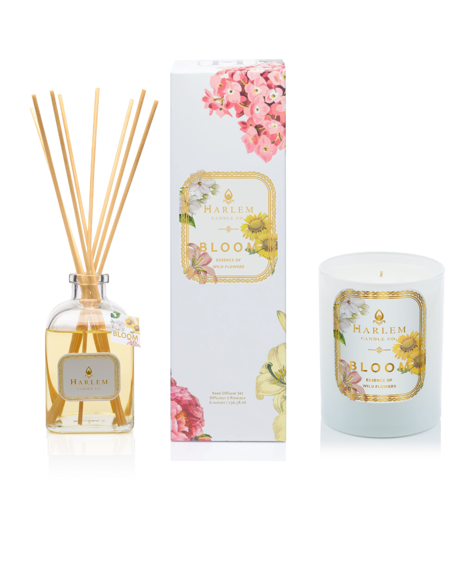 This is an image of our "Bloom" Reed Diffuser and Candle Bundle with a clear, glass diffuser bottle and a one wick Bloom candle.