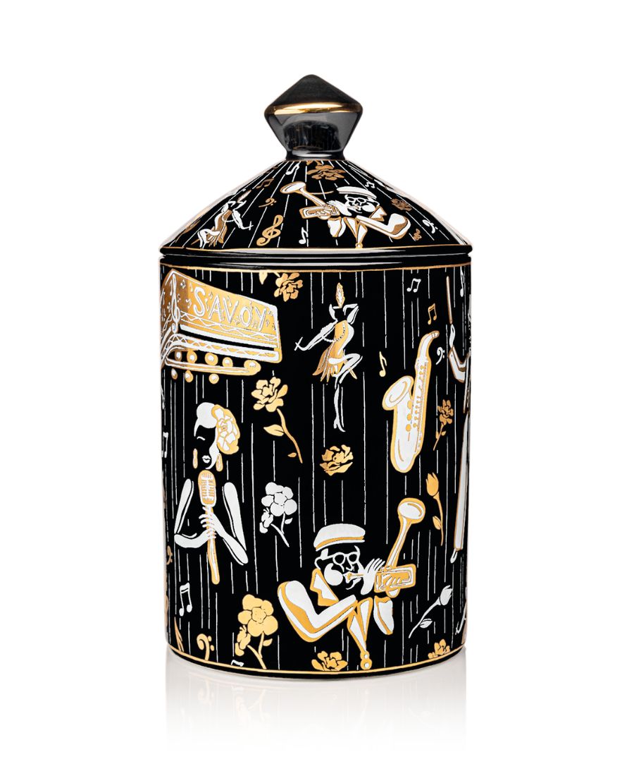 This is an image of our black gold and white Duke, ceramic candle with a lid. It features illustrations of Billie Holiday, the savoy ballroom, Duke Ellington, and other original illustrations.