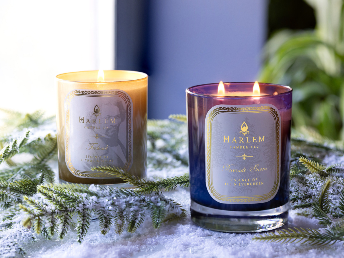 This is an image of our one wick Frederick candle, and our two wick Riverside snow candle.