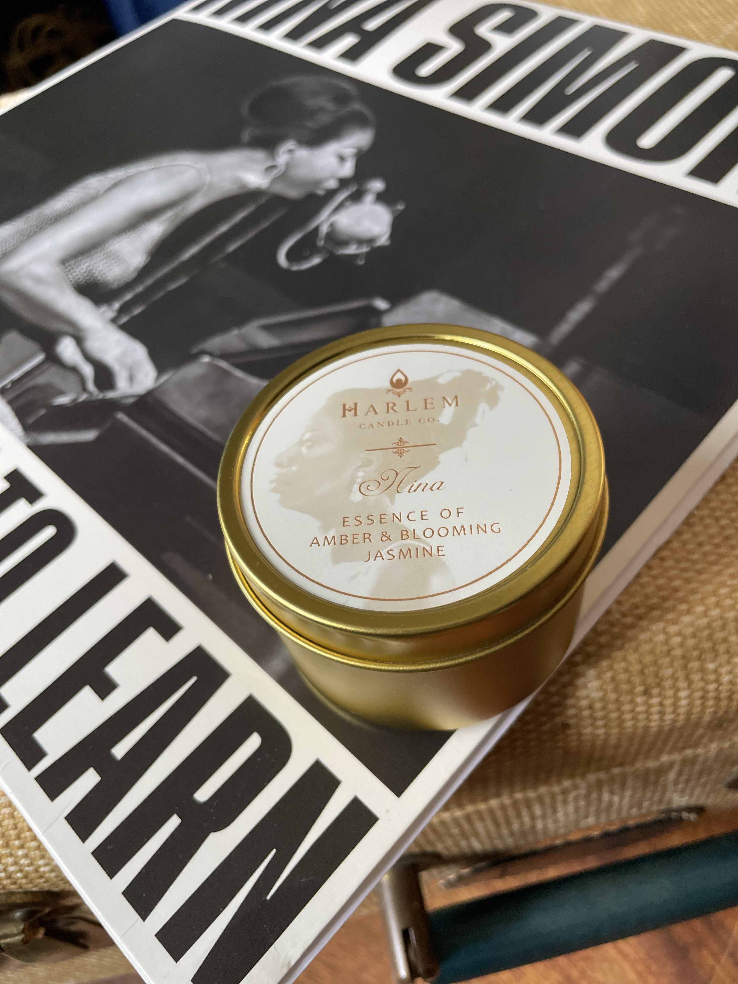This is an image of our Nina Simone candle in a travel tin