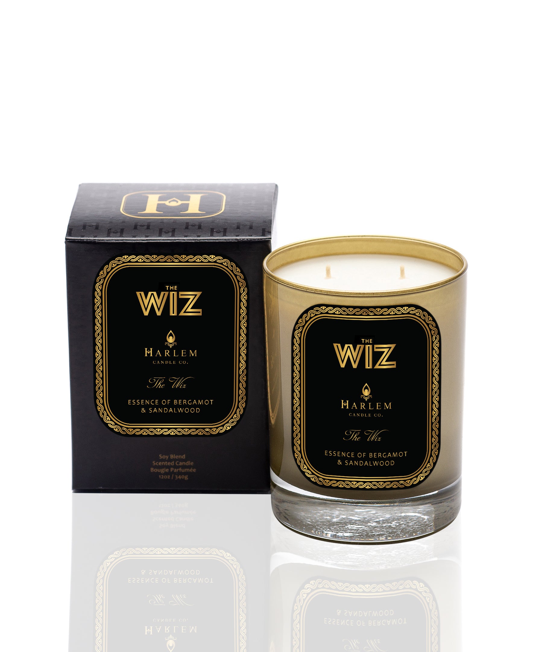 This is an image of the wiz candle with a black and gold label pictured next to its black and gold decorative box
