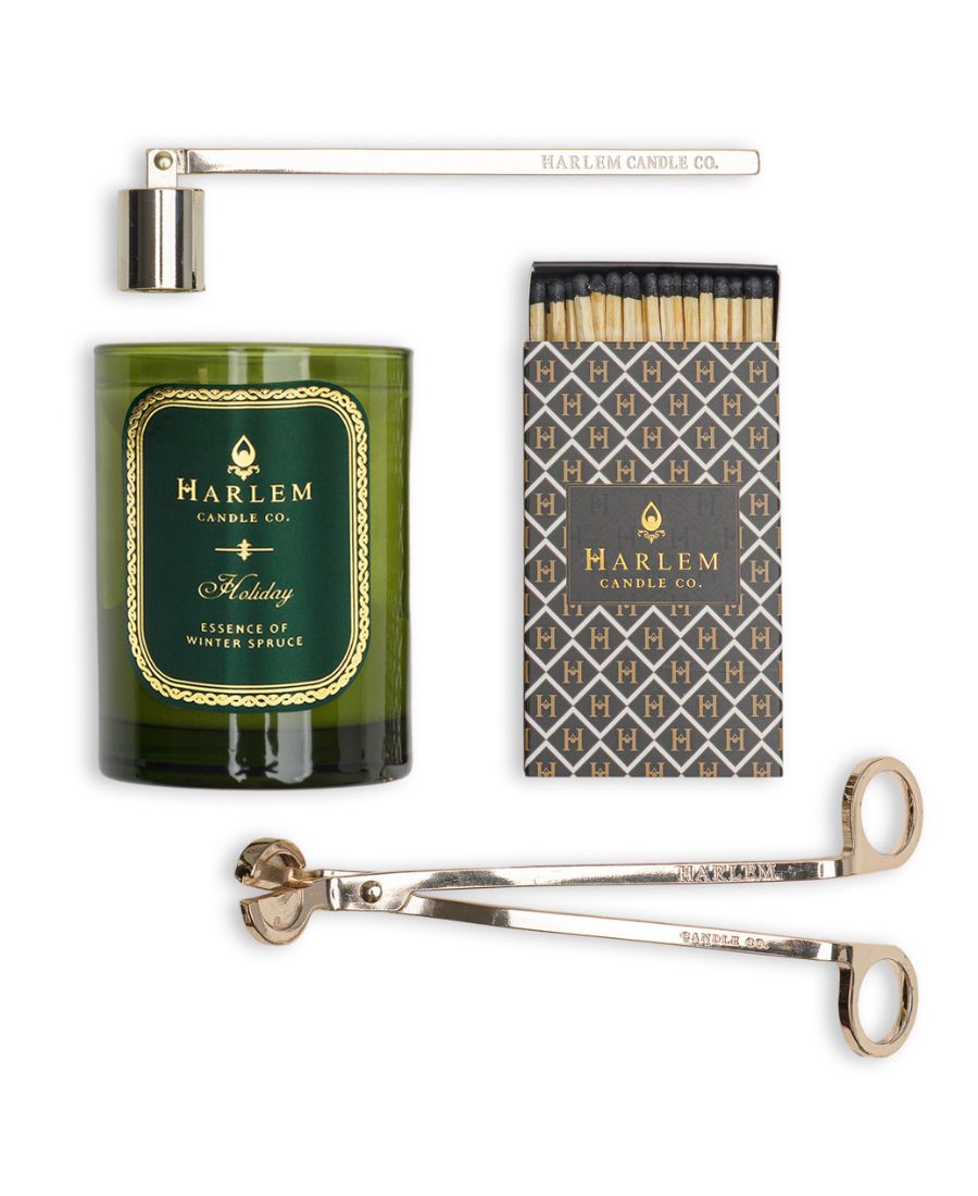 This is an image of our Green Holiday candle with long matches and the wick trimmer and snuffer.