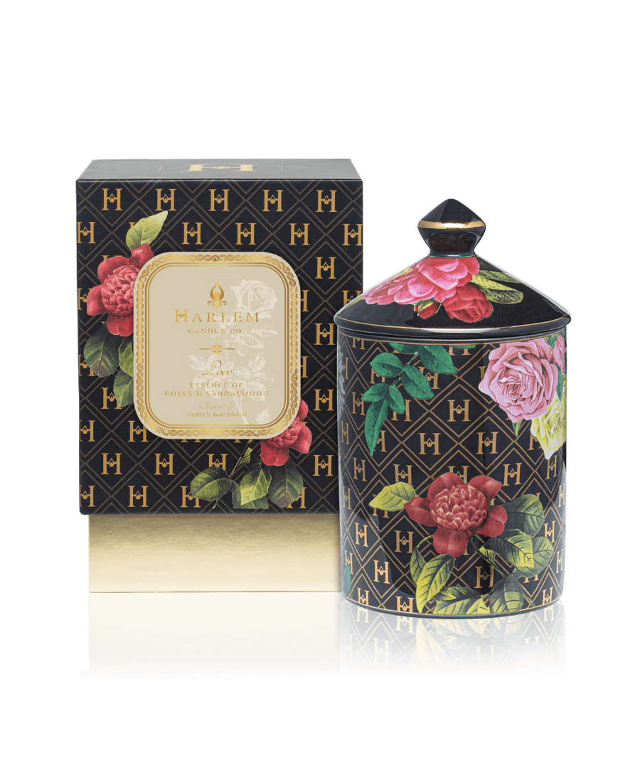 This “Love” by James Baldwin Ceramic Luxury Candle has our H pattern in 22K gold along with an art deco floral pattern on a black background featured next to its decorative box.