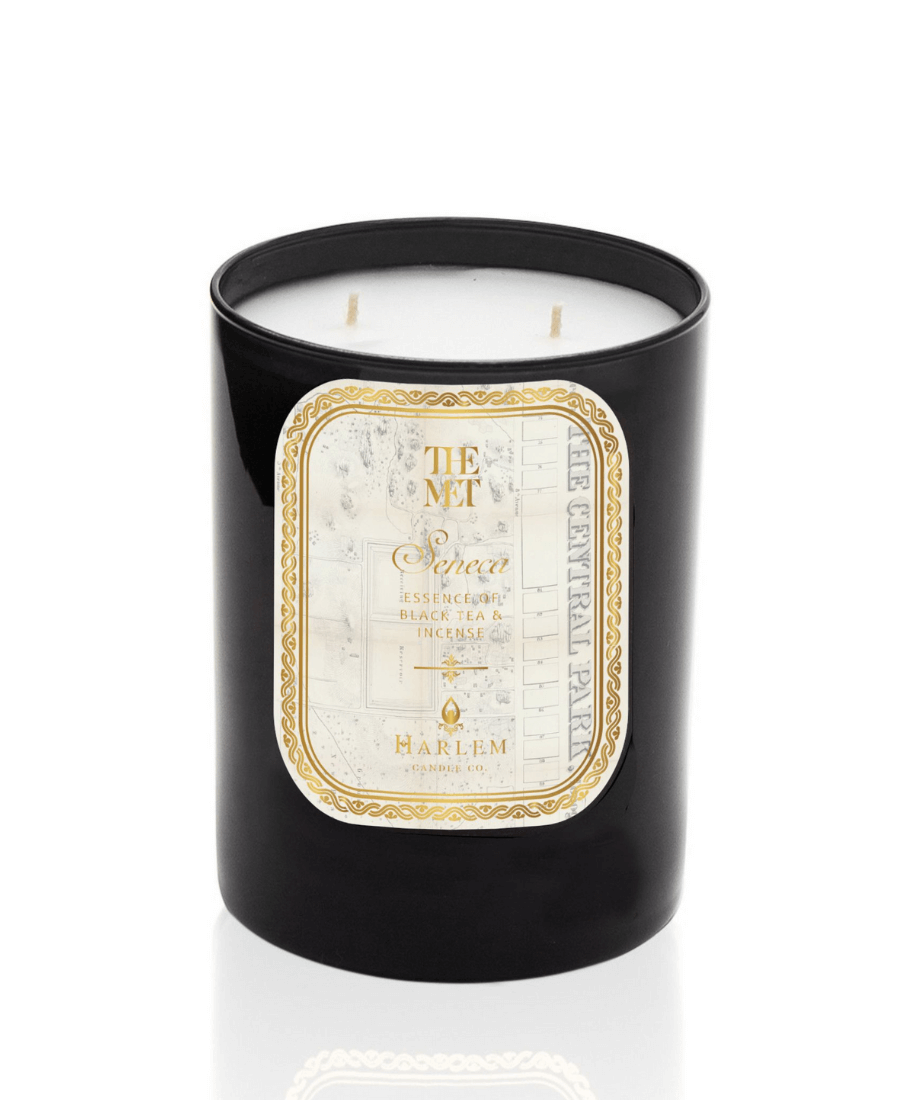 The black glass Met Seneca 12 oz two wick candle  on a white background.