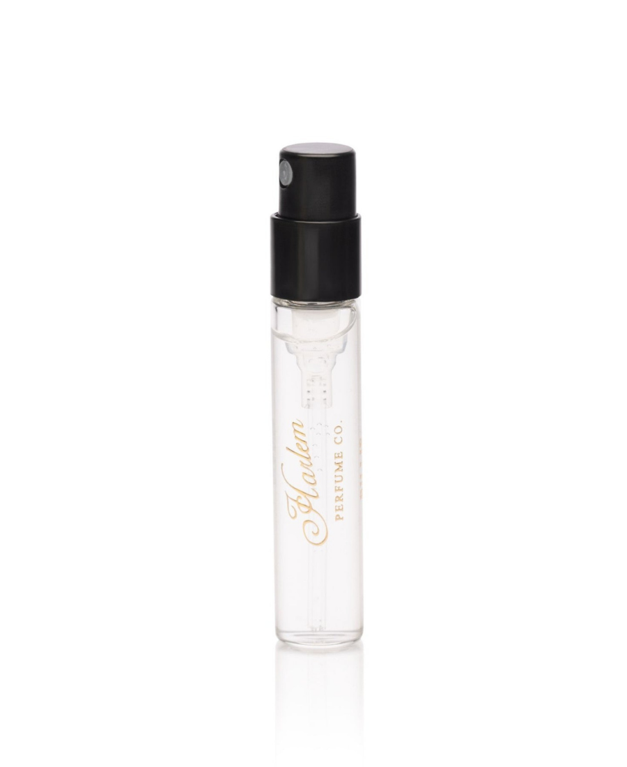 This is an image of our 2ml oz Speakeasy eau de parfum sample with a black cap and gold letters.