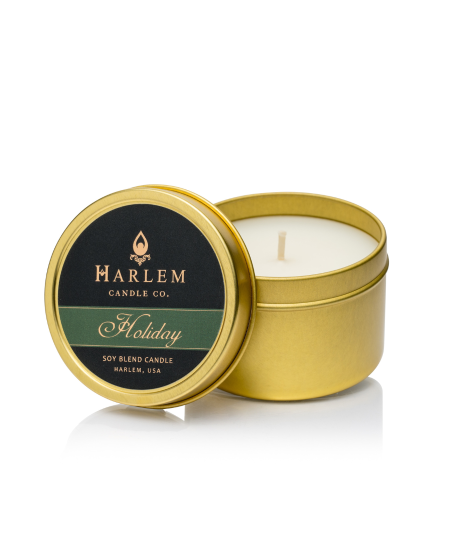 Our stunning Savoy travel candle in a  gold metal tin.