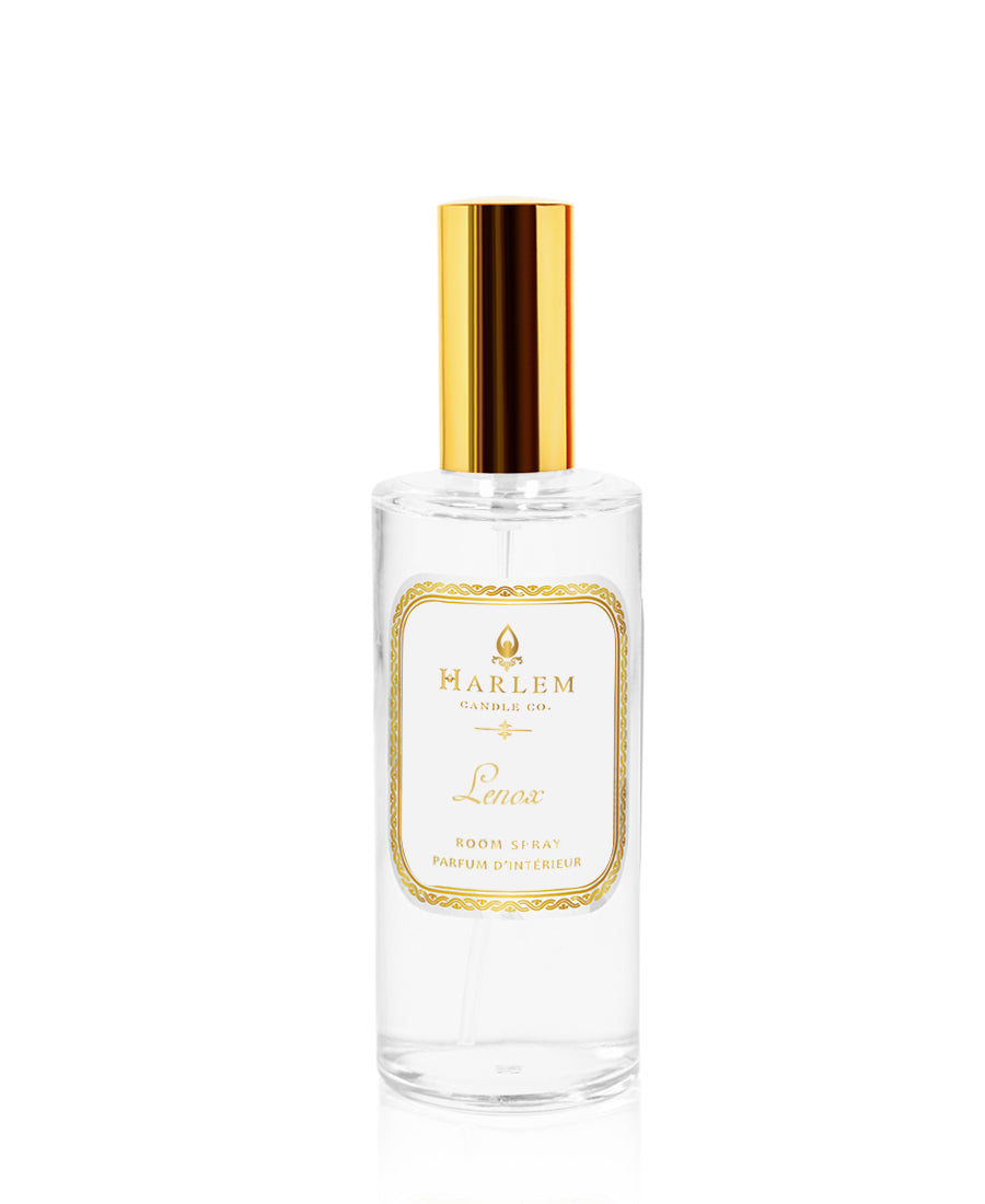 Our clear bottle of 4 oz Lenox room spray with a gold top and the essence of seductive flowers on a white background.