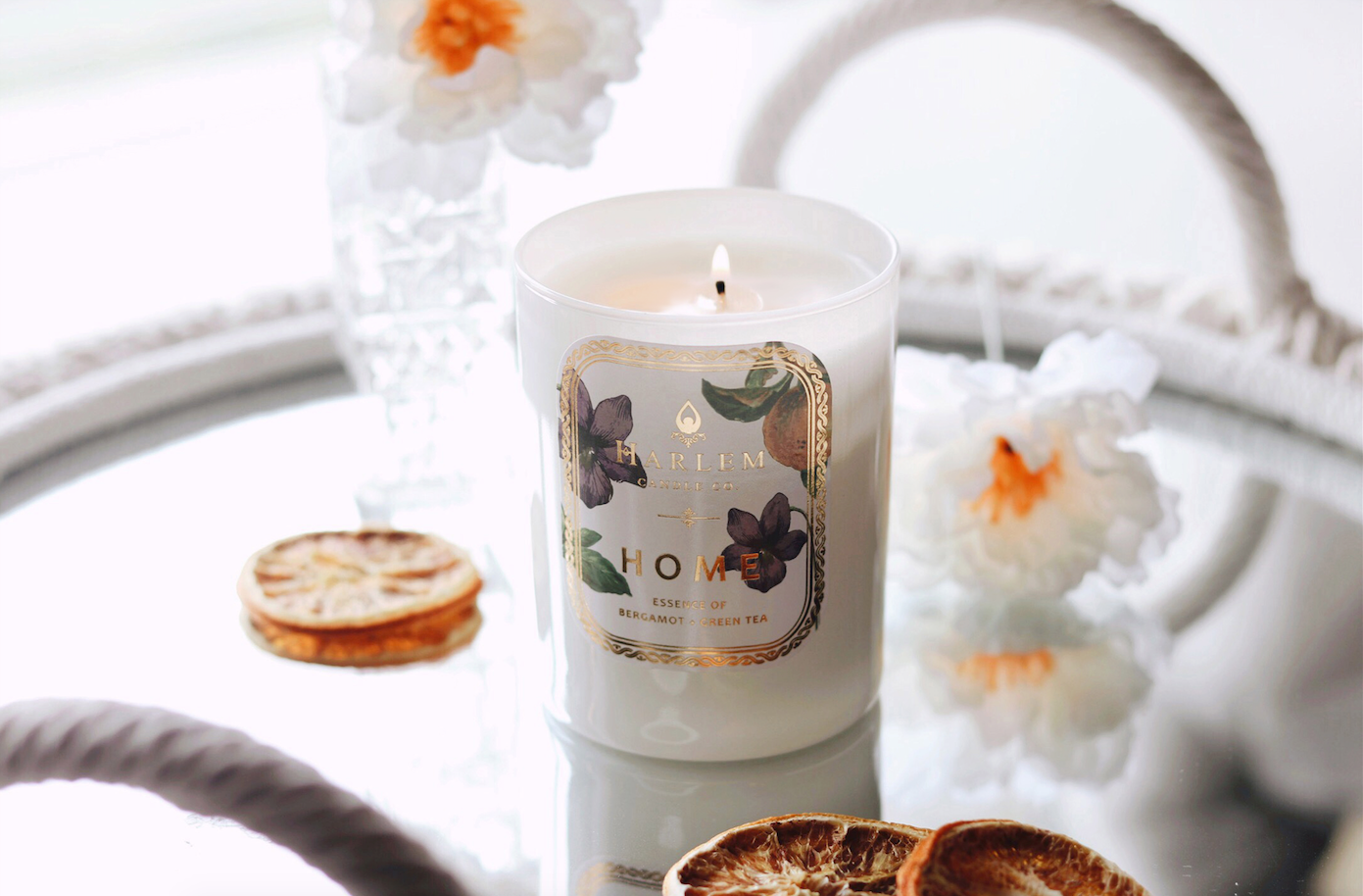 Lifestyle image of our HOME Candle from our Botanical Collection
