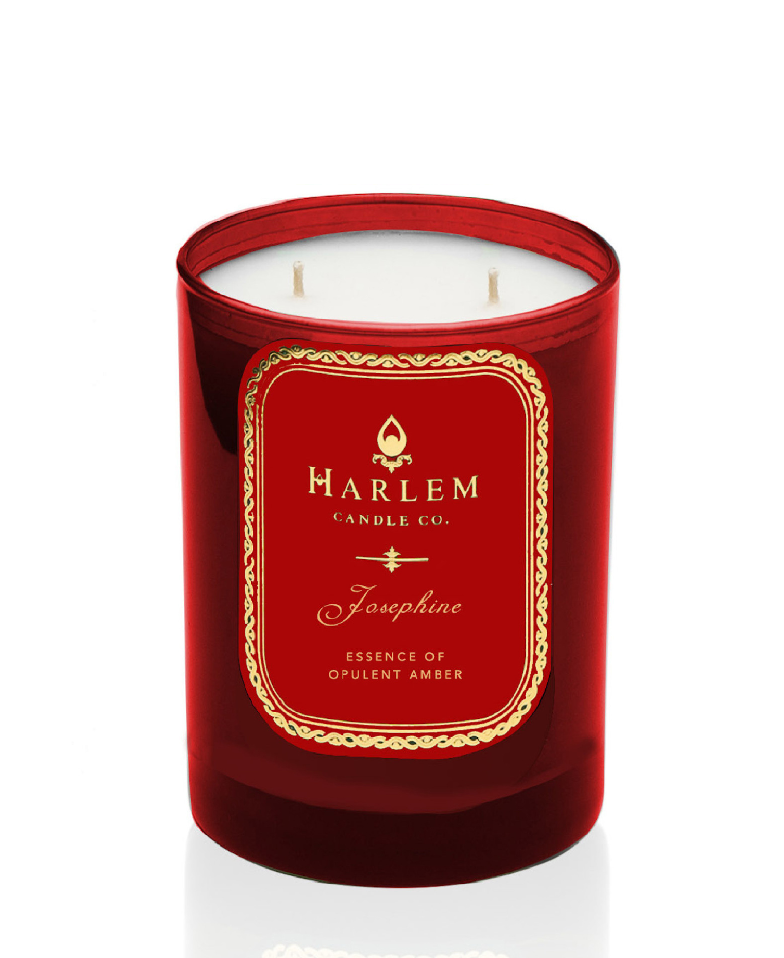 This is an image of our Josephine candle, with two weeks in a red glass with a gold and red label.