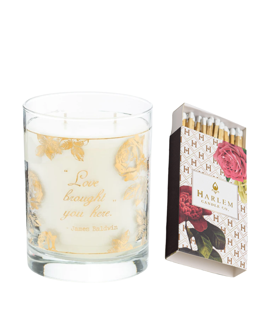 Our 22k Gold James Baldwin "Love" candle paired with the White Floral Art Deco inspired Elegant Matches on a white background.  